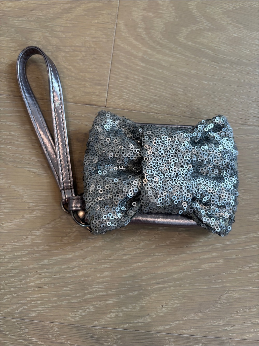 aerie Silver Sequin Bow Wristlet